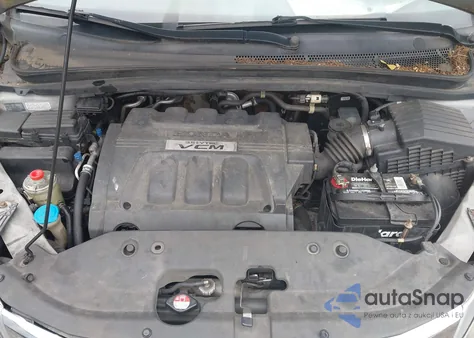 2010 Honda Odyssey Touring z USA, uszkodzony, nr VIN 5FNRL3H9XAB085936